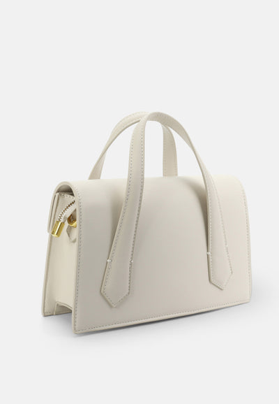 Borsa a mano Lily in ecopelle con tracolla e charm dorato colore Panna