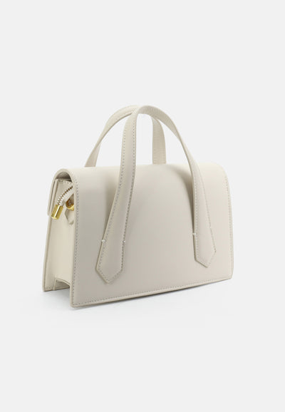 Borsa a mano Lily in ecopelle con tracolla e charm dorato colore Panna