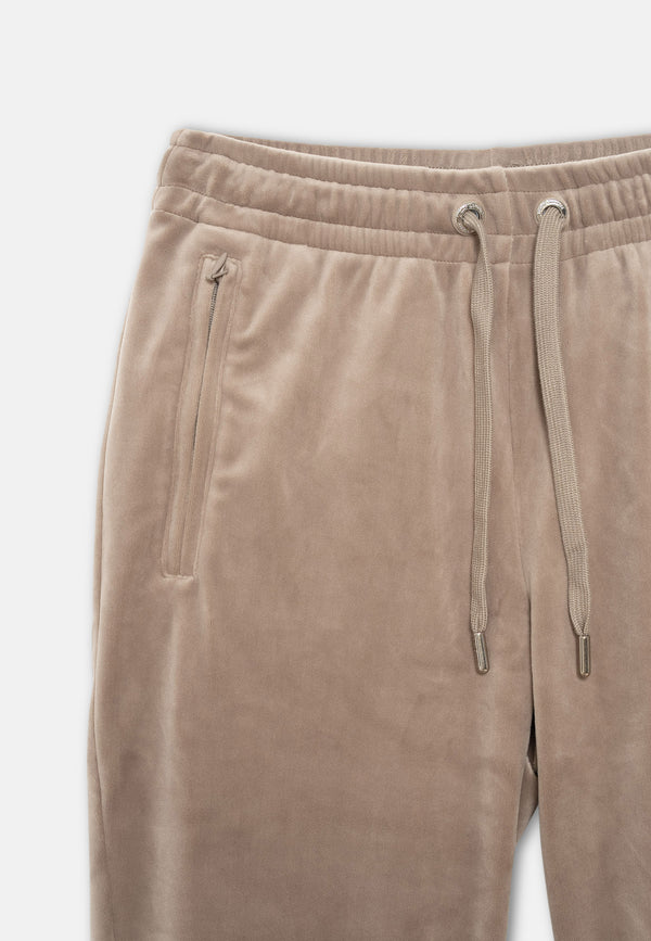 Pantaloni Lilian Tortora chiaro con elastico al fondo e logo strass