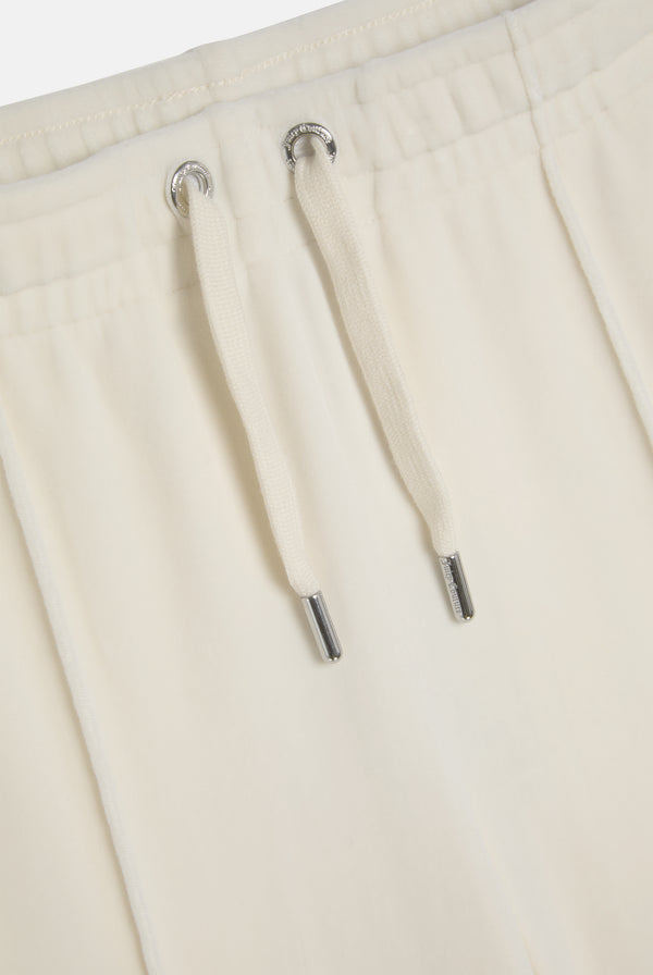 Pantaloni in velluto Tina con logo Juicy in strass colore Panna